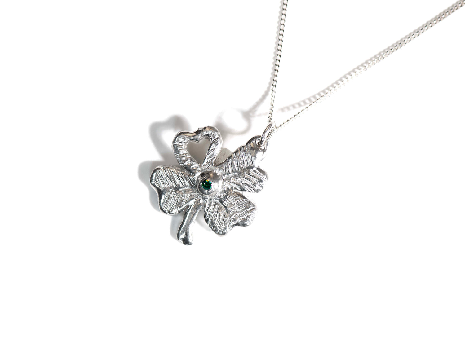 Four leaf clover pendant with green stone
