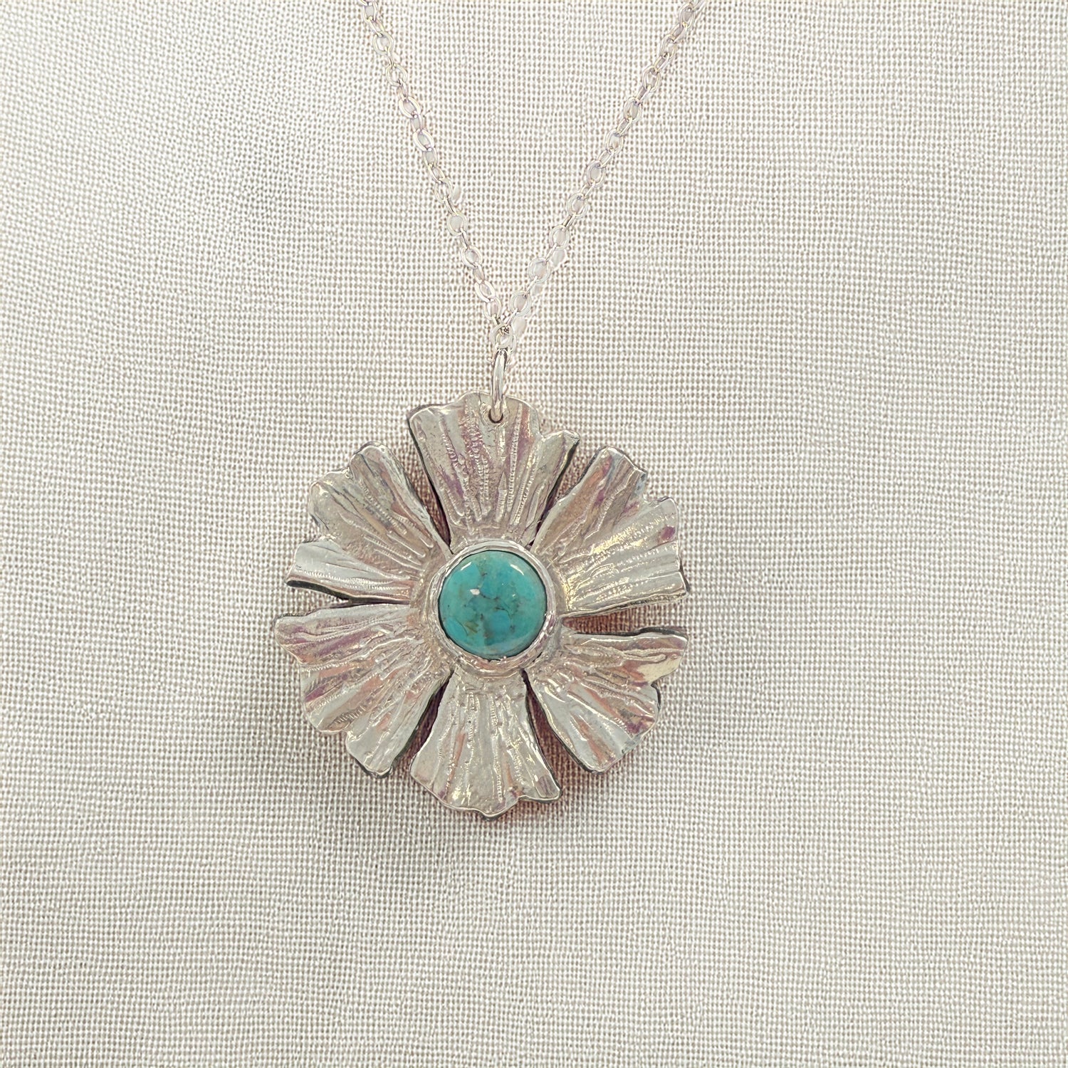 Floral pendant with turquoise centre stone