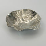 Rolled wave effect trinket dish with undulating edges